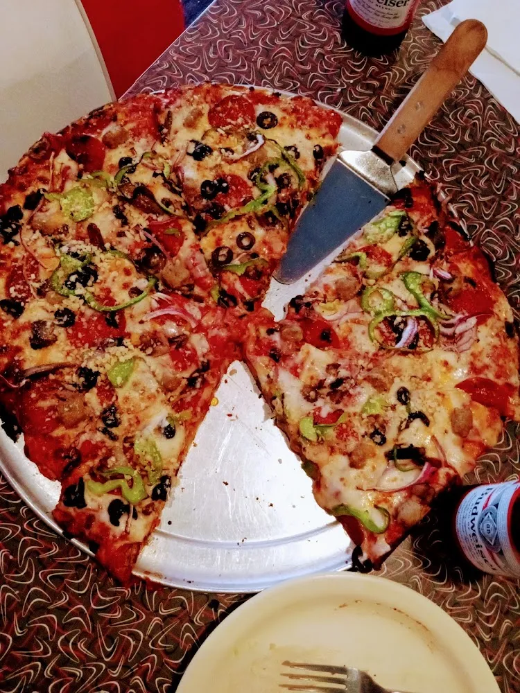 Deluxe Pizza Their Biggest One for 30 Bucks